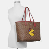 Coach Reversible City Tote in Signature Canvas with Ms. PacMan-One Quarter