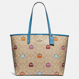 Coach Reversible City Tote in Signature Canvas with PacMan Ghosts Print-One Quarter