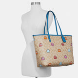 Coach Reversible City Tote in Signature Canvas with PacMan Ghosts Print-One Quarter